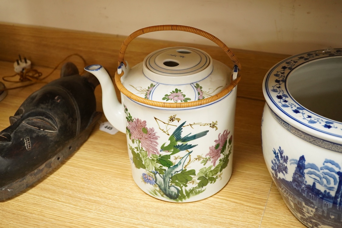 A pair of Chinese large scale teapots and a European blue and white planter, 22.5cm